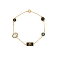 GRAINNE MORTON, FIVE MINI CHARM BRACELET, Black